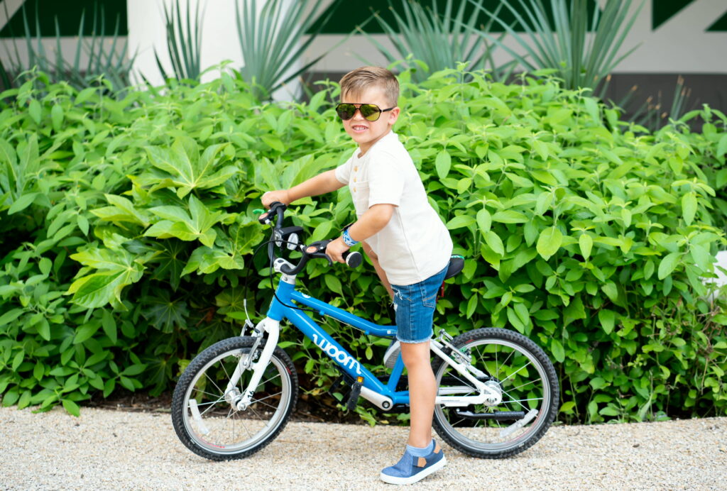 The founder's son on kids bike, the inspiration for Bike & Grow.